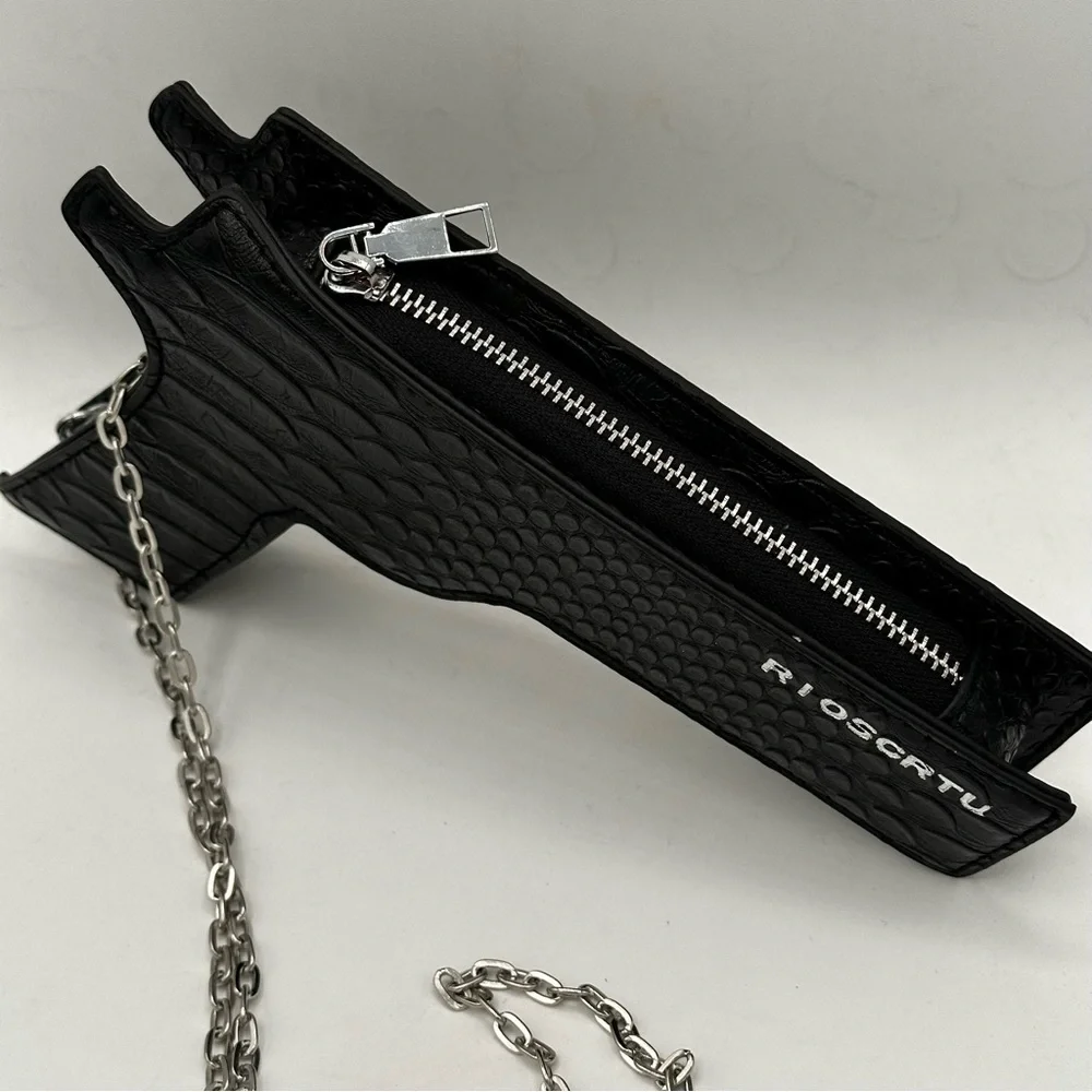 Black pistol shaped hip holster mini little purse handbag.